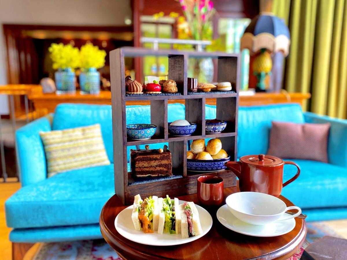 Das James Flensburg Exteriér fotografie Afternoon tea at the Imperial Hotel, Hanoi, Vietnam